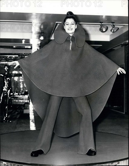 Sep. 18, 1972 - Japanese Fashions In London: Japanese-born designer Yuki has arrived in London and today showed his first creations to be on sale at this own shop in Harvey Nichols. Yuki has worked at Michael, Norkan Ha~tnell Pierre Cardin. His styles are all ~ighly individual. Photo shows Model Maria Winter wears a cape and trousers in reversible red/Green wool ?198.