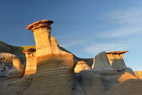 Geological formations known as 'hoodoos'; the result of erosion. Drumheller, Alberta, Canada.