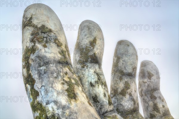 Giant hand supporting the Golden Bridge in Vietnam