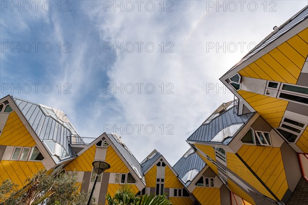 Rotterdam, Netherlands - April 23, 2019 : Yellow Cube houses - Kubuswoningen - in Blaak station area famous landmark of the city