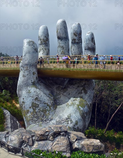 Ba Na, Vietnam - June 06, 2019; The Golden Hand Bridge at Ba Na in the central highlands of Vietnam.