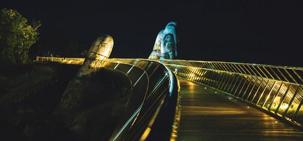 Golden bridge in Bana Hills French village, Sun World, Da Nang, Central Vietnam