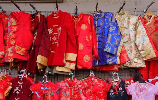 Chinese male traditional dresses called changshan, lower row are female dresses called cheongsam or qipao, usually worn during chinese celebration
