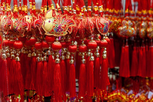 Chinese New Year ornaments on sale in Chinatown. These common ornaments have the Chinese words meaning Blessings and Peace printed on them. They are t