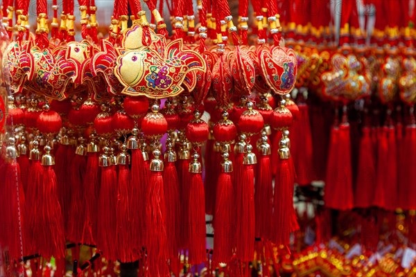 Chinese New Year ornaments on sale in Chinatown. These common ornaments have the Chinese words meaning Blessings and Peace printed on them. They are t