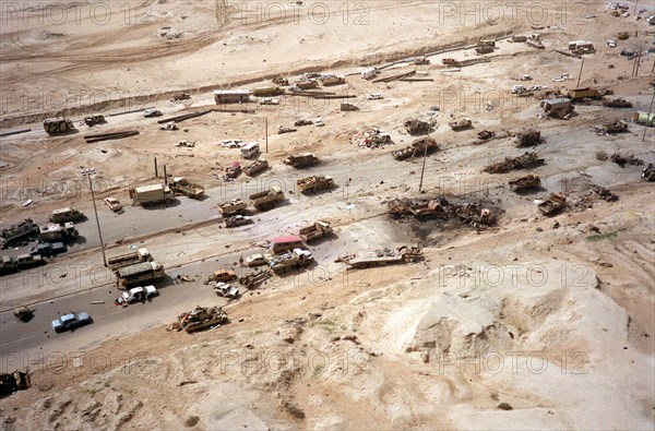 Destroyed Iraqi armored vehicles litter Highway 80, known as the Highway of Death destroyed by coalition aircraft during the Gulf War February 28, 1991 in Kuwait.