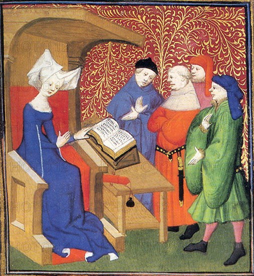 Christine de Pizan lecturing to a group of men. Christine de Pizan (1364-c.1430) was an Italian-born French medieval writer of many works, including poems of courtly love, a biography of Charles V of France, and several works championing women.  She was c