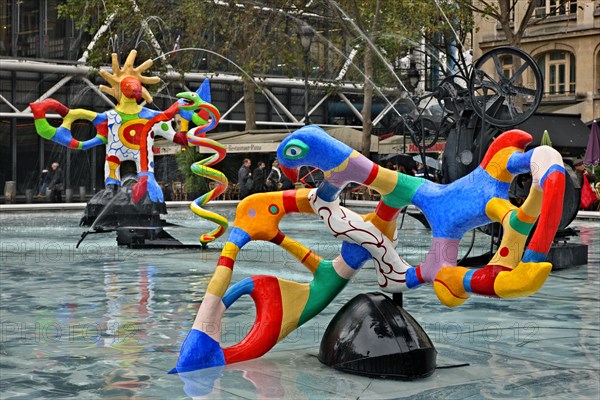 Modern sculpture at the fountain of Place Igor Stravinsky, outside the Centre Pompidou, Paris France.