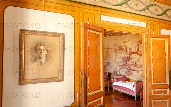 Portrait of Edmond Rostand near the door to Rosemonde's chamber at Villa Arnaga at Cambo-les-Bains, home to the poet Edmond Rostand