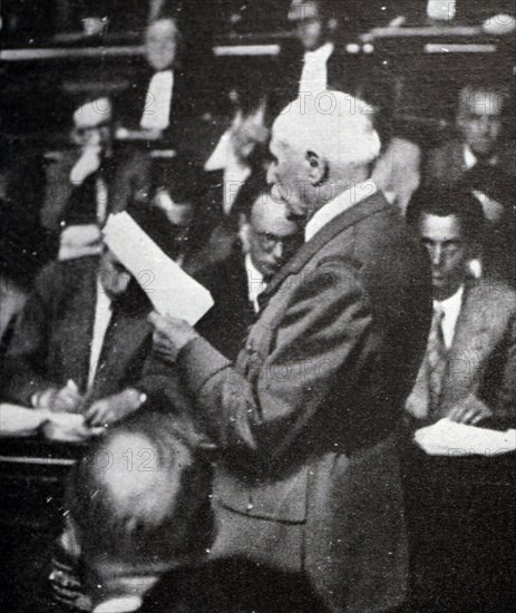 Black and white photograph of French Marshal Philippe Petain (1856-1951) during his trial for treason, pictured on 25 September 1945.