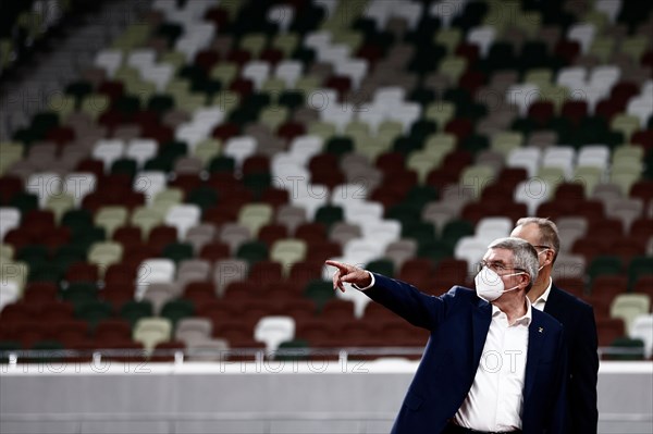 Tokyo, Japan. 17th Nov, 2020. International Olympic Committee (IOC) president Thomas Bach wearing a face mask visits the National Stadium, main venue for the 2020 Olympic and Paralympic Games postponed until July 2021 due to the COVID-19 coronavirus pandemic, in Tokyo on November 17, 2020. Credit: POOL/ZUMA Wire/Alamy Live News