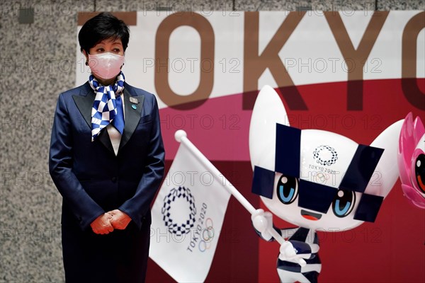 Tokyo, JPN. 14th Apr, 2021. Tokyo Gov. Yuriko Koike, stands next to the statues of Miraitowa, official mascot for the Tokyo 2020 Olympics to mark 100 days before the start of the Olympic Games Tokyo 2020 at the Tokyo Metropolitan Government building Wednesday, April 14, 2021, in Tokyo. Credit: POOL/ZUMA Wire/Alamy Live News