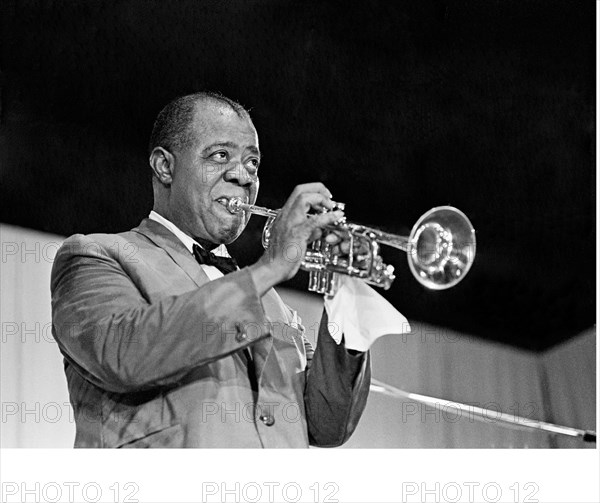 Louis Armstrong , Satchmo blows his trumpet at the Antibes Jazz Festival