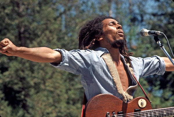 BOB MARLEY (1945-1981) Jamaican reggae musician at the Santa Barbara Bowl in 1976. Photo Jeffrey Mayer