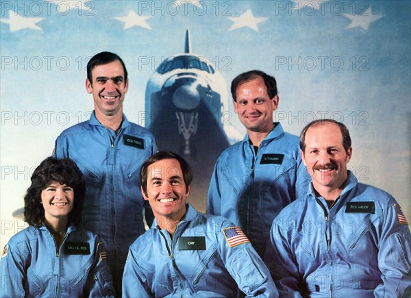Dr. Sally Ride, left, poses with her STS-7 crewmates Dr. Sally Ride, Commander Bob Crippen, Pilot Frederick Hauck (FRONT L-R) and John Fabian, Norm Thagard (BACK L-R) in Houston, USA, 21 June 1983. In addition to launching America's first female astronaut, it was also the first mission with a five-member crew. Photo: NASA via CNP