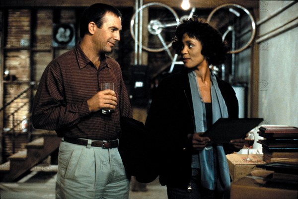 RELEASE DATE: November 25, 1992. MOVIE TITLE: The Bodyguard. STUDIO: Kasdan Pictures. PLOT: A former Secret Service agent takes on the job of bodyguard to a pop singer, whose lifestyle is most unlike a President's. PICTURED: WHITNEY HOUSTON as Rachel Marron and KEVIN COSTNER as Frank Farmer.
