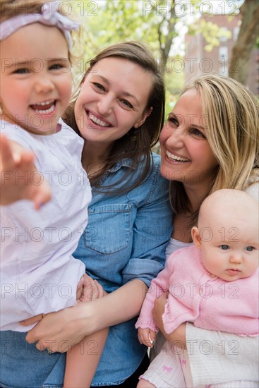 Portrait of Caucasian mothers and daughters