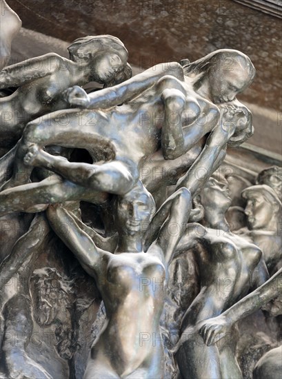 Paris - Museum Rodin. The Gates of Hell is a monumental sculptural group work by Rodin that depicts a scene from "The Inferno",  Dante Alighieri's Div