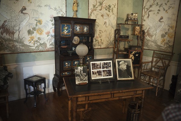 Nohant-Vic, the castle of George Sand (Le château de George Sand). Interior. A drawing room. Family photographs.