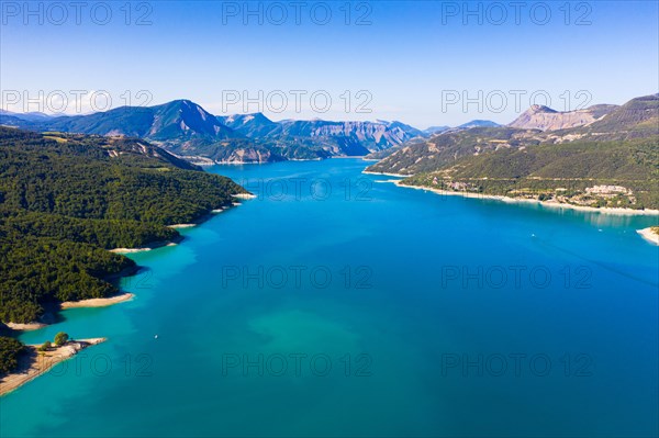 Panoramic scenic view of Serre-Poncon Lake and Alps in southeast France