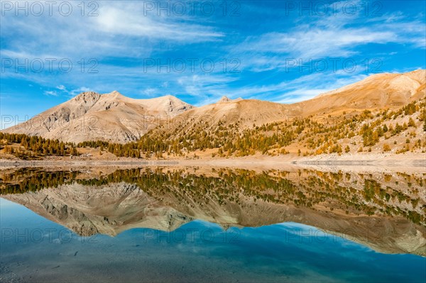 France - Provence - Haut Verdon - Mont Pelat is reflected in Lac Allos.