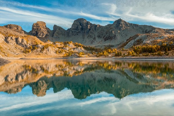 France - Provence - Haut Verdon - Reflection of the Tours du Lac in the Lac Allos.