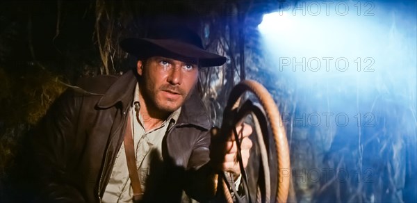 USA. Harrison Ford in a scene from the (C)Paramount Pictures film : Raiders of the Lost Ark (1981).  
PLOT: In 1936, archaeologist and adventurer Indiana Jones is hired by the U.S. government to find the Ark of the Covenant before Adolf Hitler's Nazis can obtain its awesome powers. 
Ref: LMK110-J6874-220121
Supplied by LMKMEDIA. Editorial Only.
Landmark Media is not the copyright owner of these Film or TV stills but provides a service only for recognised Media outlets. pictures@lmkmedia.com