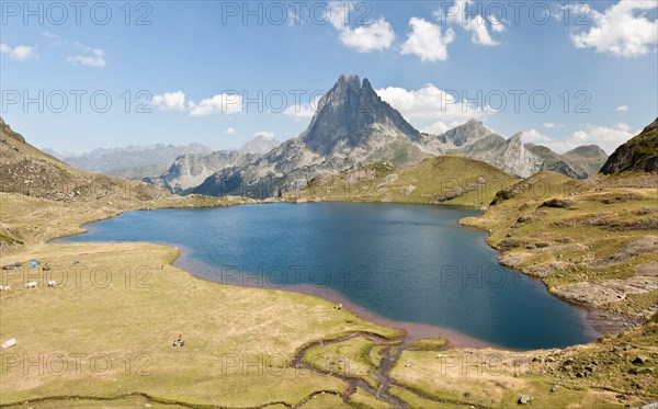 The West side of the Midi d'Ossau Peak and the Gentau Lake, seen from the vantage point of the Ayous refuge (Western Pyrenees).
