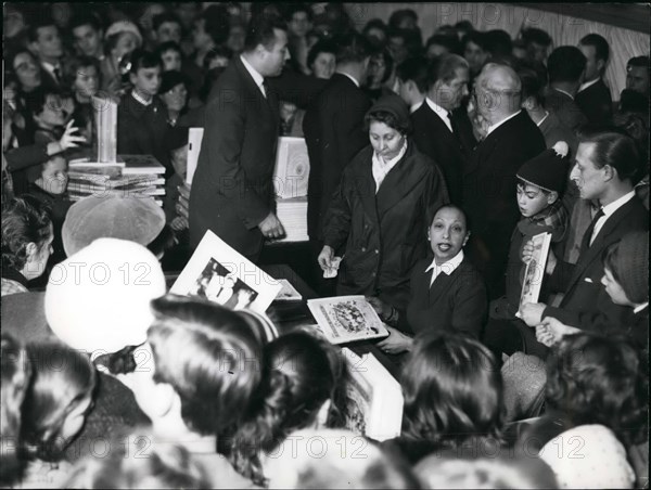 Dec. 12, 1957 - Josephine Baker in Frankfurt: Well known star Josephine Baker arrived at Frankfurt to sell her Book ''Children of the Rainbow'' in one of the big stores at Frankfurt. People went crazy for buying Books with Josephines own Autogram.