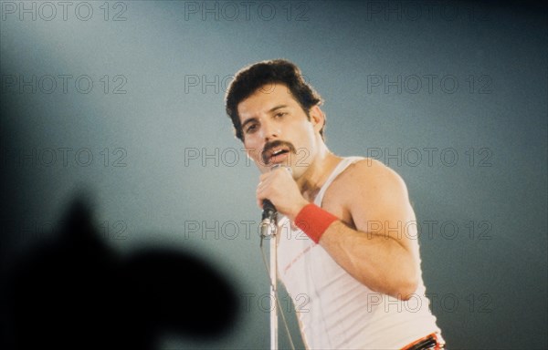 LEIDEN, THE NETHERLANDS - NOV 27, 1980: Freddy Mercury singer of the british band Queen during a concert in the Groenoordhallen