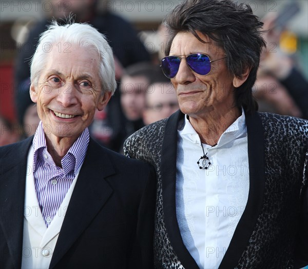 London, UK. 4th April, 2016. Charlie Watts and Ronnie Wood of the Rolling Stones at Exhibitionism Opening Night Gala at Saatchi Gallery in London. 4th April 2016.

 Credit:  Landmark Media/Alamy Live News