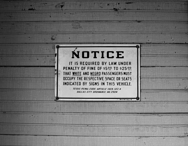 Pre civil rights sign requiring separate seating for Whites and Negroes on old railroad depot historic Buffalo Gap, Texas, USA