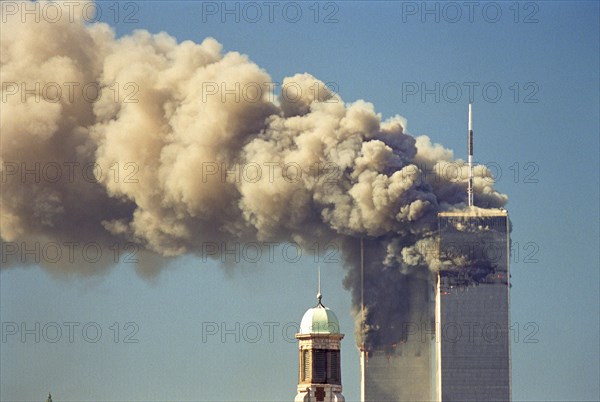 World Trade Center Attack photos taken from 14 street on a rooftop as the towers burn