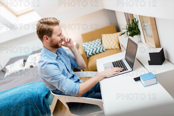 Self employed businessman working from home