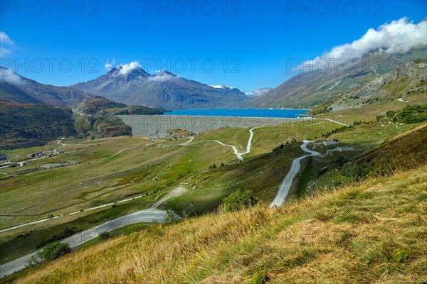 Col de Mont Cenis mountain pass between France and Italy with large lake, reservoir,