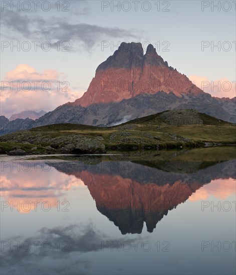 Reflections at sunset of Pic du Midi D'Ossau in the Lac D Ayous
