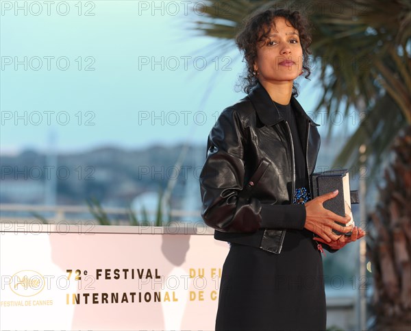 CANNES, FRANCE - MAY 25: Mati Diop, winner of the Grand Prix Award for the film "Atlantique", poses at the photocall for Palme D'Or Winner during the