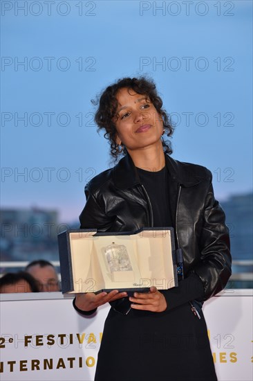 CANNES, FRANCE. May 25, 2019: Mati Diop at the Palme d'Or Awards photocall at the 72nd Festival de Cannes.
Picture: Paul Smith / Featureflash