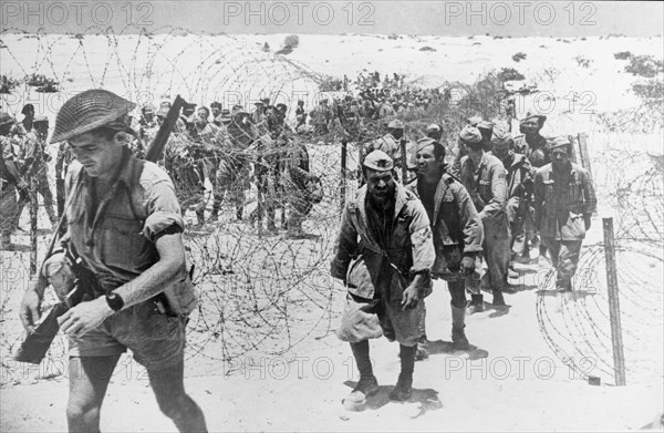 Italian troops surrendering in the North African desert at the battle of El Alamein in Egypt