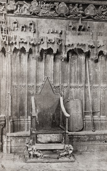 The Coronation Chair, Westminster Abbey, City of Westminster, London, England. Here seen with the Stone of Scone which was returned to Scotland in 1996. From Their Gracious Majesties King George VI and Queen Elizabeth, published 1937.