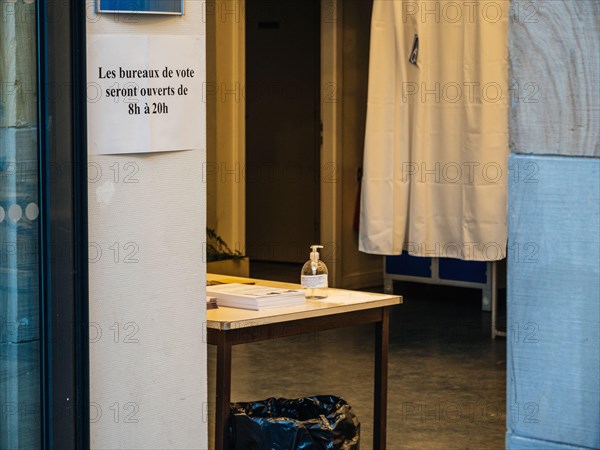 Strasbourg, France - Mar 15, 2020: Hand sanitizer at polling station during the first round of mayoral elections in Paris as France grapples with an outbreak of coronavirus disease COVID-19