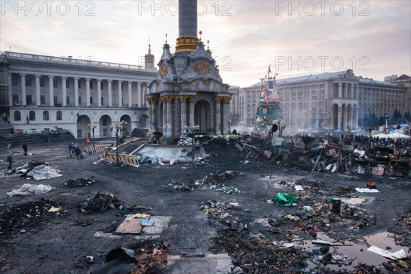 KIEV, UKRAINE - February 20, 2014: Mass anti-government protests in the center of Kiev. Independent square in Kiev, Ukraine after two days of violent clashes between riot police and Euromaidan protesters.