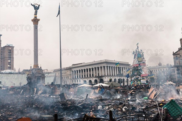 KIEV, UKRAINE - February 19, 2014: Mass anti-government protests in the center of Kiev. Barricades at on Independence Square after a night of fights