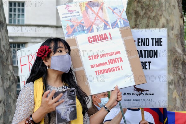 A Myanmar protester calls for the boycotting of the Beijing Winter Olympic Games 2022 over multiple human rights abuses committed by China.