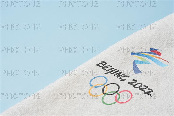 14 December 2021 - Los Angeles, USA: Beijing 2022 Winter Olympic Games and towel. International sport event. Winter Olympics 2022 in Beijing, China