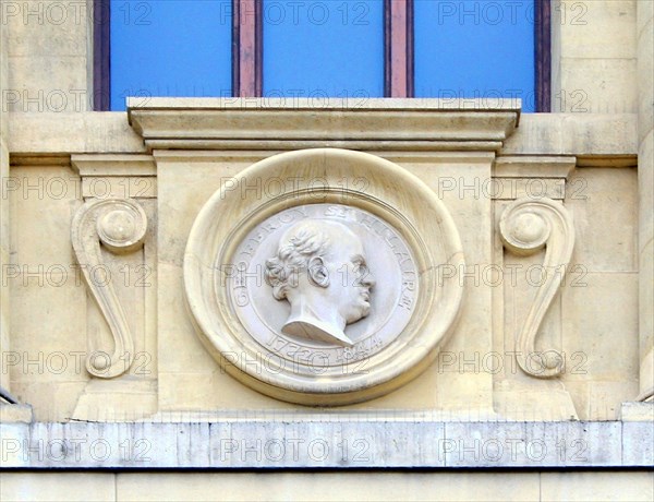 Etienne Geoffroy Saint-Hilaire. Fifth mascaron (left), façade of the Grande Galerie de l'Evolution in Jardin des Plantes of Pari