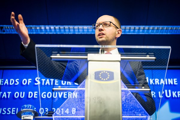 March 6, 2014 - Brussels, Belgium - Ukraine's new Prime Minister ARSENIY YATSENUK holds a press conference after attending a EU-Ukraine head of states summit at the EU council headquarters. MPs in Crimea have asked Moscow to allow the southern Ukrainian region to become part of the Russian Federation. The parliament said if its request was granted, Crimean citizens could give their view in a referendum on 16 March. Ukraine's interim Prime Minister Arseniy Yatsenyuk said the move had no legal grounds. Crimea, a region whose population is mostly ethnic Russian, has been at the centre of tensions