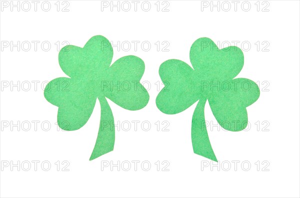 Paper St. Patrick shamrocks decoration on isolate white background