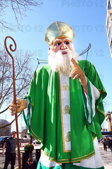 London, UK. 16th March 2014. A giant figure of St. Patrick takes part in the St. Patrick's Day Parade 2014 in London, England Credit:  Paul Brown/Alamy Live News