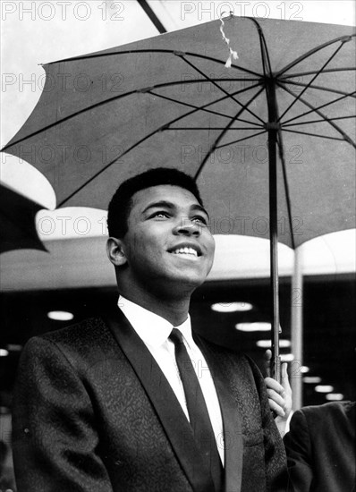 Sep 02, 1966; Frankfurt, Germany; CASSIUS CLAY or MUHAMMAD ALI, world champion in heavy weight, came to Frankfurt, Germany on Agust 30th. to have a title fight to European champion Karl Mildenberger in the Frankfurter Waldstadion on September 1st, 1966 shows Cassius Clay in front of his hotel.